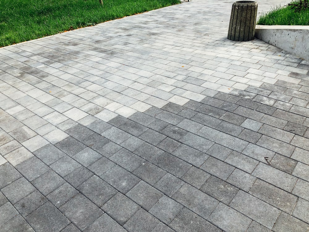 applying a penetrating sealer to an exposed aggregate driveway in Gahanna Columbus OH
